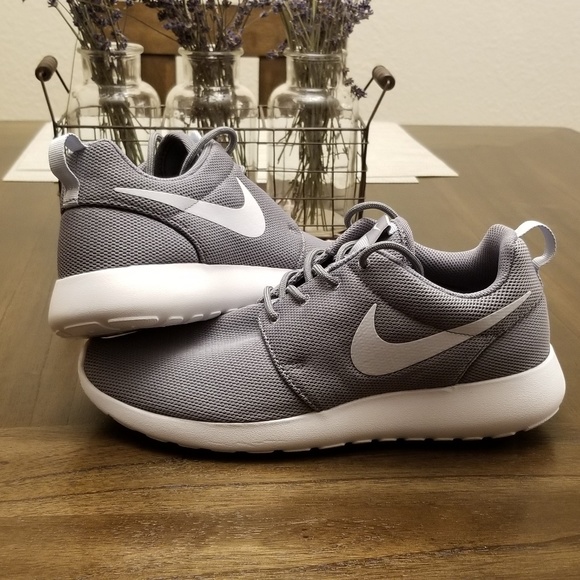grey and white roshe runs